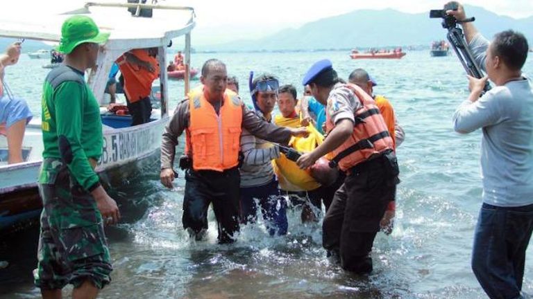 rescue-personnel-help-victims-of-boat-blast