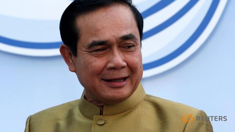 thailand-s-prime-minister-prayuth-chan-ocha-smiles-as-he-arrives