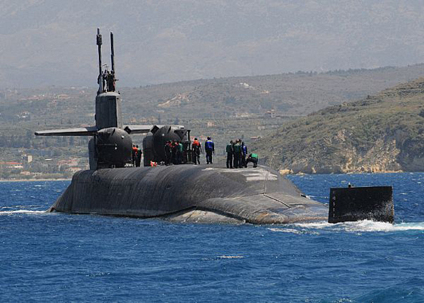 130524-N-JN142-277 SOUDA BAY, Greece (May 24, 2013) The Ohio-class guided-missile submarine USS Florida (SSGN 728) departs Souda harbor after a routine port visit. Florida, homeported in Kings Bay, Ga., is deployed conducting maritime security operations and theater security cooperation efforts in the U.S. 6th Fleet area of responsibility.  (U.S. Navy photo by Peggy Bebb/Released)