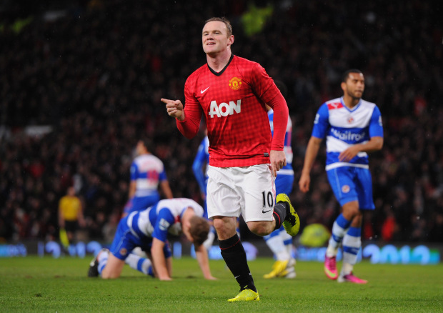 MANCHESTER, ENGLAND - MARCH 16:  Wayne Rooney of Manchester United celebrates scoring the opening goal during the Barclays Premier League match between Manchester United and Reading at Old Trafford on March 16, 2013 in Manchester, England.  (Photo by Michael Regan/Getty Images)