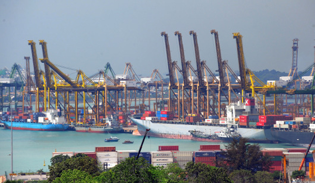 This photo taken on March 4, 2009 shows a view of the container port in Singapore. Singapore's economy may contract by as much as 10 percent this year if exports continue to fall sharply, the country's influential founding father Lee Kuan Yew said in remarks published March 5. AFP PHOTO/ROSLAN RAHMAN (Photo credit should read ROSLAN RAHMAN/AFP/Getty Images)