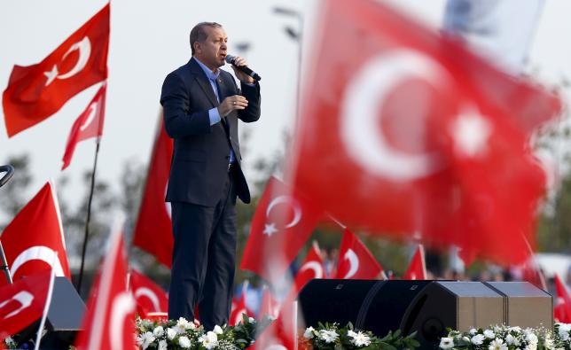 Turkey's President Erdogan makes his speech during a rally against recent Kurdish militant attacks on Turkish security forces in Istanbul