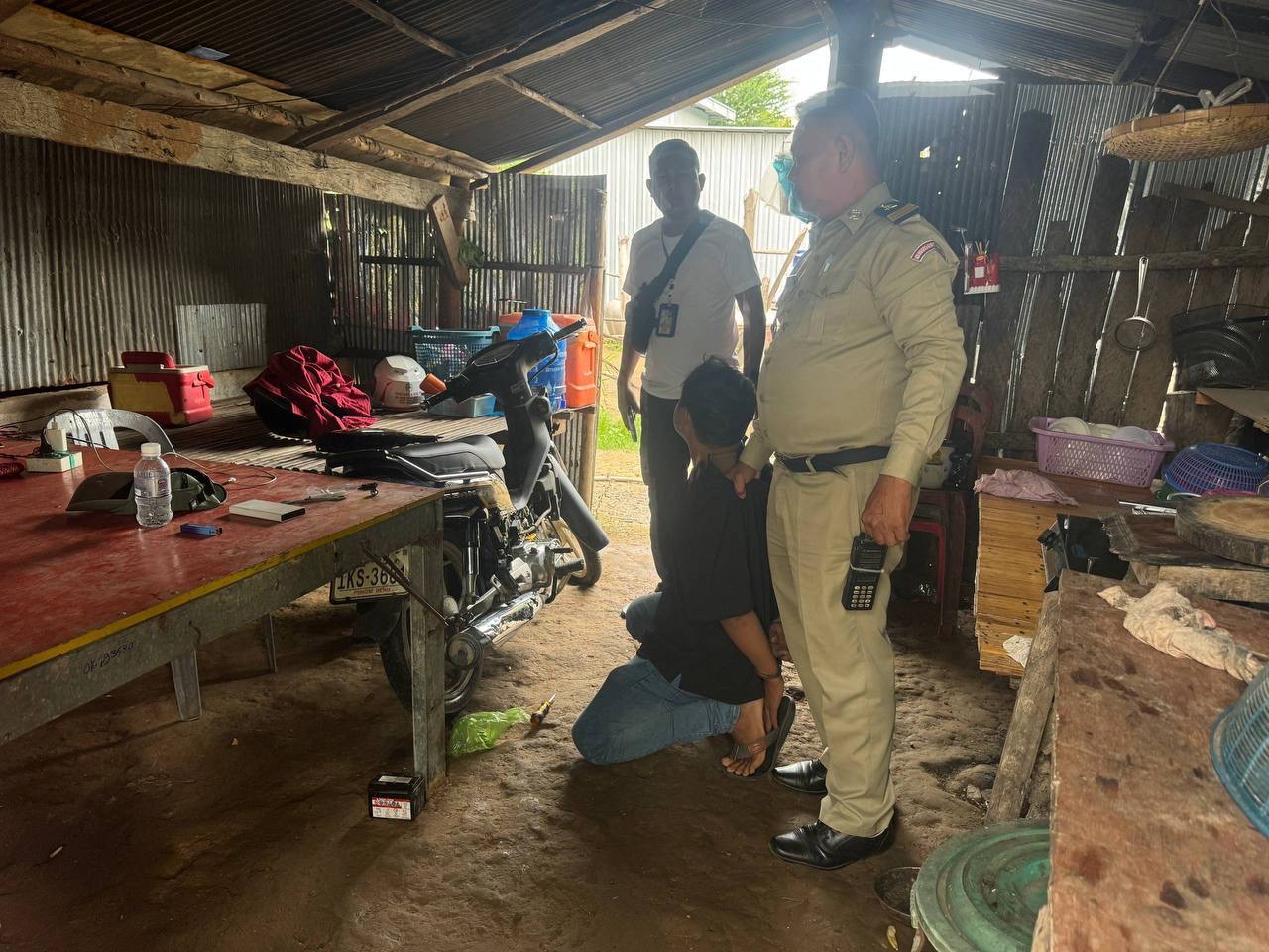 Police with the recovered motorcycle